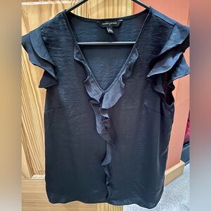 Black ruffled sleeveless dress shirt
